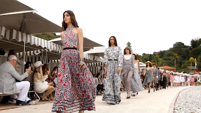 Among the race-inspired wear are plenty of breezy, flowy dresses. Photo: EPA