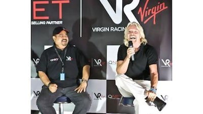 Richard Branson, right, with Vijay Eswaran, the executive chairman of the QI Group, at Yas Marina in 2010.