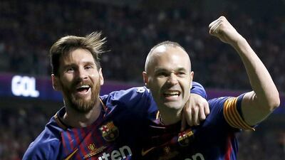 Lionel Messi, left, and Barcelona will be aiming to win el clasico in the final time Andres Iniesta, right, faces Real Madrid. Ballesteros / EPA