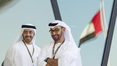 General Sheikh Mohamed bin Zayed Crown Prince of Abu Dhabi Deputy Supreme Commander of the UAE Armed Forces (R), and Sheikh Abdullah bin Zayed Minister of Foreign Affairs (L), attend the Formula 1 Etihad Airways Abu Dhabi Grand Prix at Yas Marina Circuit. Ryan Carter / Crown Prince Court - Abu Dhabi