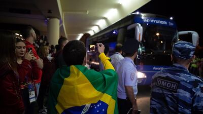 Team Brazilian team are greeted by fans as they arrive in Sochi. Their opening match is against Switzerland on June 17. Buda Mendes / Getty Images