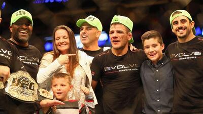 Rafael dos Anjos celebrates his win against Anthony Pettis in the lightweight title bout at UFC 185 on Saturday in Dallas. Ronald Martinez / Getty Images / AFP