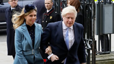 Britain's Prime Minister Boris Johnson and his partner Carrie Symonds arrive to attend the annual Commonwealth Day service. AP Photo