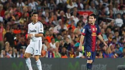Barcelona's Lionel Messi, right, and Real Madrid's Cristiano Ronaldo.