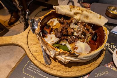Princess kebab at Cafe Otantik is a diverse dish of meats served over mashed aubergine alongside chargrilled peppers and buttery bread covered in cheese