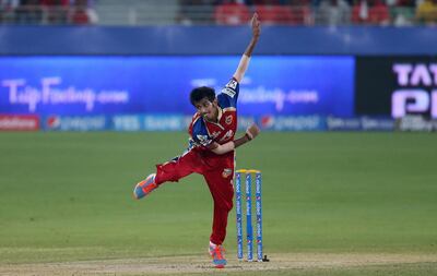 DUBAI , UNITED ARAB EMIRATES Ð April 28 , 2014 : Yuzvendra Chahal of RCB bowling during the IPL match between Royal Challengers Bangalore vs Kings XI Punjab at Dubai International Cricket Stadium in Dubai. ( Pawan Singh / The National ) For Sports.