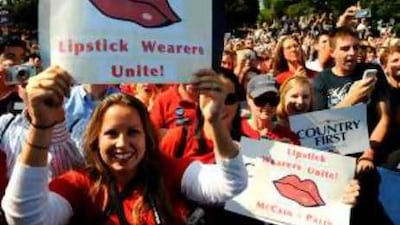 Supporters cheer as John McCain and Sarah Palin take the stage at a campaign event in Virginia.