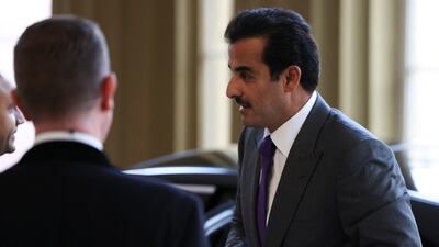 Emir of Qatar Sheikh Tamim arrives at the reception. Reuters