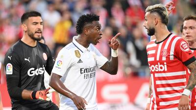 Real Madrid's Brazilian forward Vinicius Junior reamonstrates with Girona's Argentinian forward Taty Castellanos. AFP