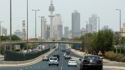 Vehicles drive down a highway in the Kuwaiti capital Kuwait City on May 31, 2020 after authorities eased some of the restrictions put in place because of the coronavirus pandemic. AFP