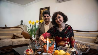 Former Kurdish fighter Saad Qazi and his wife Parang Jahani pose with their traditional costumes during the Nowruz celebrations in Erbil, the capital of Iraq's autonomous Kurdish region. AFP