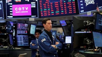 A trader on the floor of the New York Stock Exchange. US stocks ended the week with deep selloff, leaving them lower the for the five days. Lucas Jackson / Reuters
