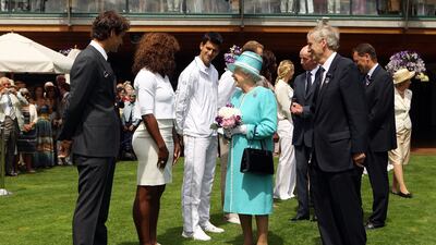 Queen Elizabeth at Wimbledon with tennis stars Roger Federer, Serena Williams, Novak Djokovic, Andy Roddick, Venus Williams and Caroline Wozniacki. Getty