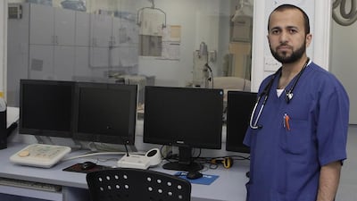 Dr Mohammed Al Raqabani, a cardiologist at Rashid Hospital, and other health experts warn that heart attacks occur earlier in the UAE due to obesity, smoking and lack of exercise. Jeffrey E Biteng / The National