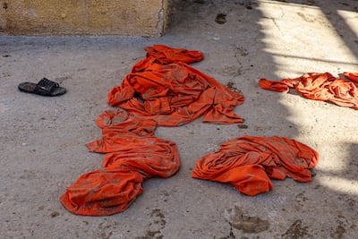 The discarded clothes of prisoners at the now-empty Al Shaddadi ISIS prison in Syria. EPA