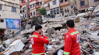 Lebanese civil defense and rescue workers search for survivors in the rubble of an old residential building that collapsed in the Bab Al Tabbaneh district of Tripoli. AFP