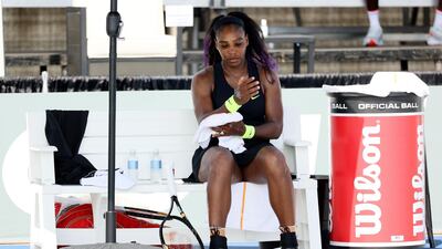 Serena Williams rests between games. AFP