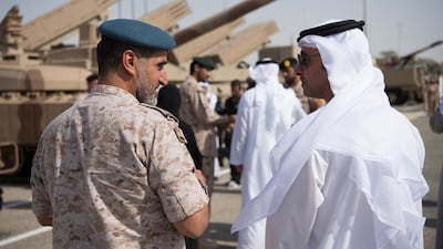 Sheikh Hazza bin Zayed, UAE National Security Advisor and Vice Chairman of the Abu Dhabi Executive Council, right, speaks with Staff Major General Faris Khalaf Al Mazrouei, Chairman of the UAE Critical Infrastructure and Coastal Protection Authority. Rashed Al Mansoori / Crown Prince Court — Abu Dhabi