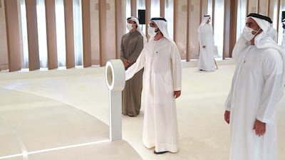 Sheikh Mohammed bin Rashid, Vice President and Ruler of Dubai, launches the industrial strategy "Operation 300bn" as Sheikh Mansour bin Zayed, Deputy Prime Minister and Minister of Presidential Affairs, left, and Sheikh Saif bin Zayed, Minister of Interior, look on. Wam