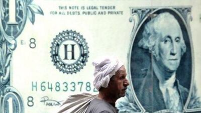 The IMF wants reassurances that Egypt's government can push through a fiscal and financial programme that includes tax increases and spending cuts. Amr Nabil/ AP Photo