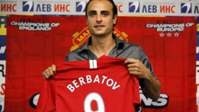 Manchester United's new signing, Bulgaria's international Dimitar Berbatov, poses with his team's shirt during a news conference yesterday in the Bulgarian capital Sofia.