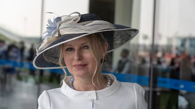 A wide-brim hat teamed with a round-collared outfit
