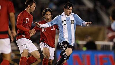 Lionel Messi weaves his way through Albania's defence during Argentina's 4-0 friendly win at the Monumental.