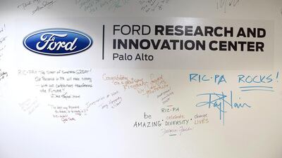 Comments and signatures on a white board wall inside the Ford Motor research laboratory. Eric Risberg / AP Photo