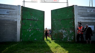 Emily Eavis opens the gate on day one of the Glastonbury Festival at Worthy Farm, Pilton, Somerset. Getty Images