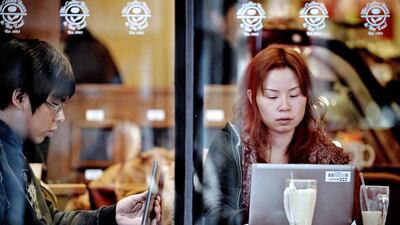 Chinese millennials are more confident about achieving their wealth ambitions. Philippe Lopez / AFP