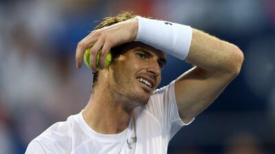 Andy Murray reacts during his loss to Kevin Anderson during the US Open fourth round on Monday in New York City. Clive Brunskill / Getty Images / AFP / September 7, 2015