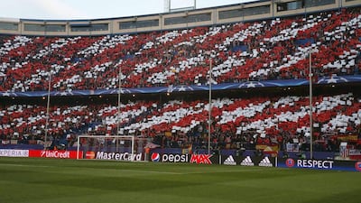 Atletico Madrid supporters cheer for their team before the Uefa Champions League quarter-final, second leg match between Atletico Madrid and FC Barcelona at Vicente Calderon stadium in Madrid, Spain, 13 April 2016. EPA/KIKO HUESCA