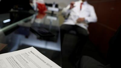 Information about the new coronavirus is seen on the desk of doctor Jorge Baruch Diaz inside a clinic at Benito Juarez international airport in Mexico City, Mexico. Reuters