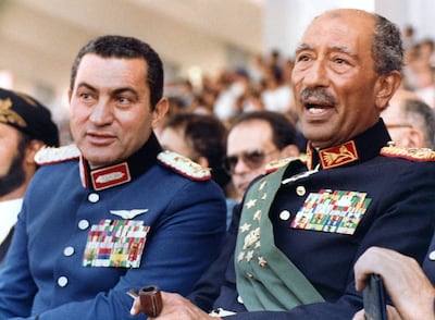 Egypt's former presidents Anwar Sadat, right, and Hosni Mubarak. Sadat banned Bahaa Taher from publishing in 1975. AFP