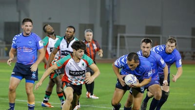 Action from the opening round of the Nissan Rugby League Cup between Dubai Sharks, blues, and Abu Dhabi Harlequins. Victor Besa / The National