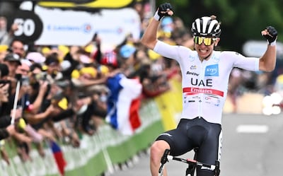 UAE Team Emirates rider Tadej Pogacar celebrates his stage win. AFP