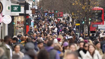 Shoppers on London's Oxford Street. Retail sales volumes fell by 1 per cent in December, the Office for National Statistics said. PA
