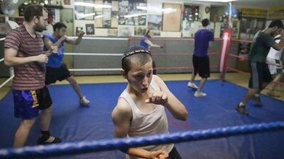 Young fighters at the Maccabi Jerusalem Boxing Club enjoy a work out in the ring.