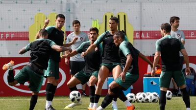 Portugal's Pepe, Cristiano Ronaldo and Bruno Alves during training. Grigory Dukor / Reuters