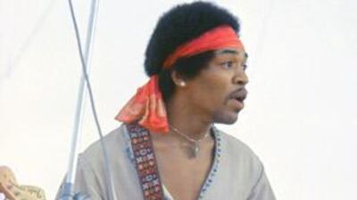 The legendary guitarist Jimi Hendrix on stage at the Woodstock Music and Arts Fair in Bethel, New York in 1969.