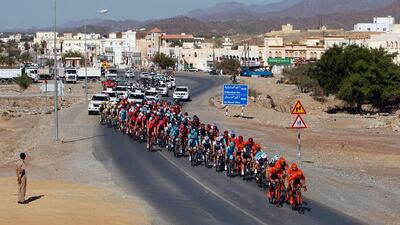 The peloton rides during the fourth stage of the Tour of Oman on Friday. Mohammed Mahjoub / AFP