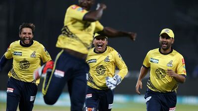 Players of Peshawar Zalmi celebrating after winning the match against Karachi Kings in the Pakistan Super League T20 match at Sharjah Cricket Stadium in Sharjah. Peshawar Zalmi won the match by 3 runs. Pawan Singh / The National