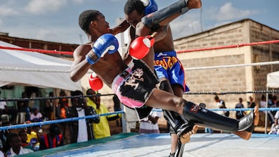 Muay Thai fighters during the Kibra Youth Initiative boxing exhibition at Kibera Fort Jesus grounds in Nairobi, Kenya. AFP