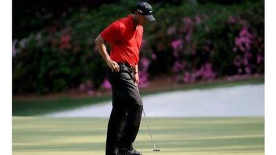 Tigers Woods reacts disconsolately to a missed putt in a tournament earlier this year. Responding to a question posed in yesterday's Sports section, a reader says golf is better off with more competition now. Harry How / AFP