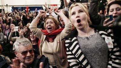 Syriza supporters cheer at exit poll results which indicate that the radical leftist party have a clear lead on January 25, 2015, in Athens, Greece. Milos Bicanski/Getty Images)
