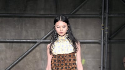 Marni: Here, circles serve to soften the look, while boxy squares in a two-toned print bring this outfit bang up to date.