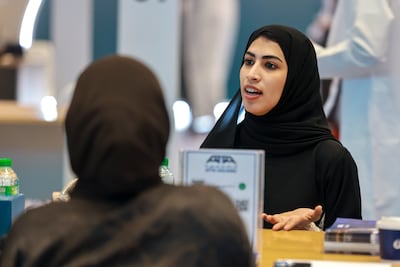 Emiratis keen to find roles in the industry and advanced technology sectors flocked to the job fair. Victor Besa / The National