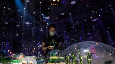 The Japan pavilion at Expo 2020 Dubai invited people to visit the world fair when it moved to Osaka by training a spotlight on technology, tourism and innovation. Ruel Pableo for The National