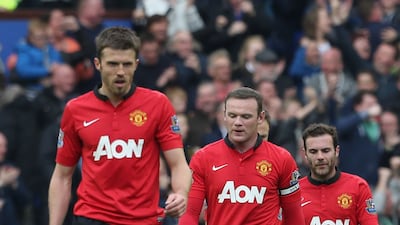 Michael Carrick, Wayne Rooney and Juan Mata show their disappointment during the 2013-14 season, when United finished in seventh with 64 points, currently their lowest ever tally. Getty