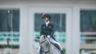 Morocco's Noor Slaoui and her horse Cash In Hand during the Equestrian Eventing Dressage competition. AP